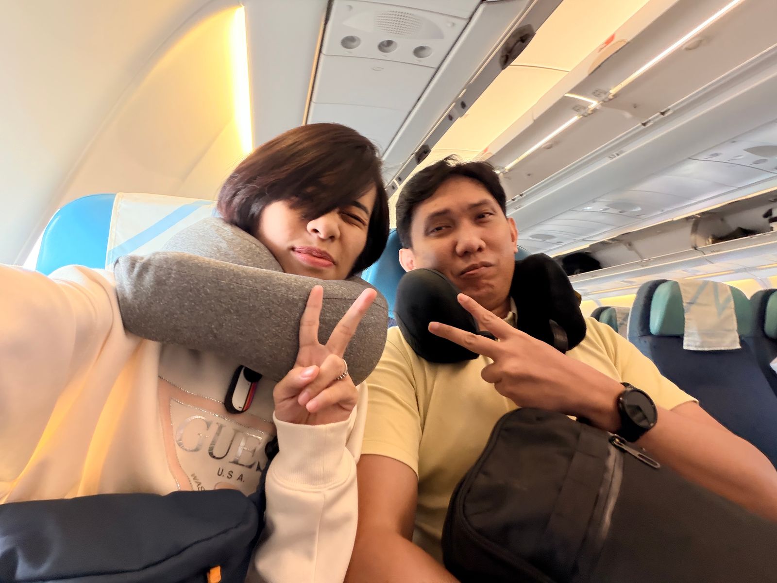 Dine and Marcus traveling by plane